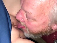 While the cuckold licks up the cum, the wife is